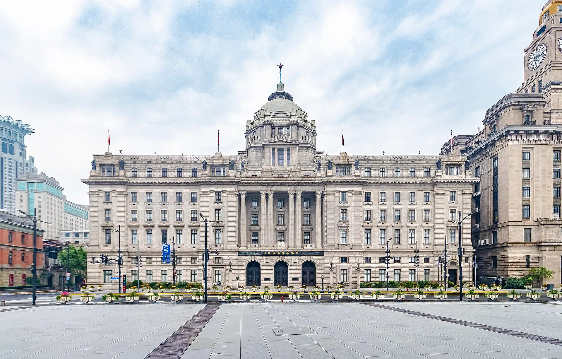 The HSBC Building with its dome, seen across the open square on the Bund.