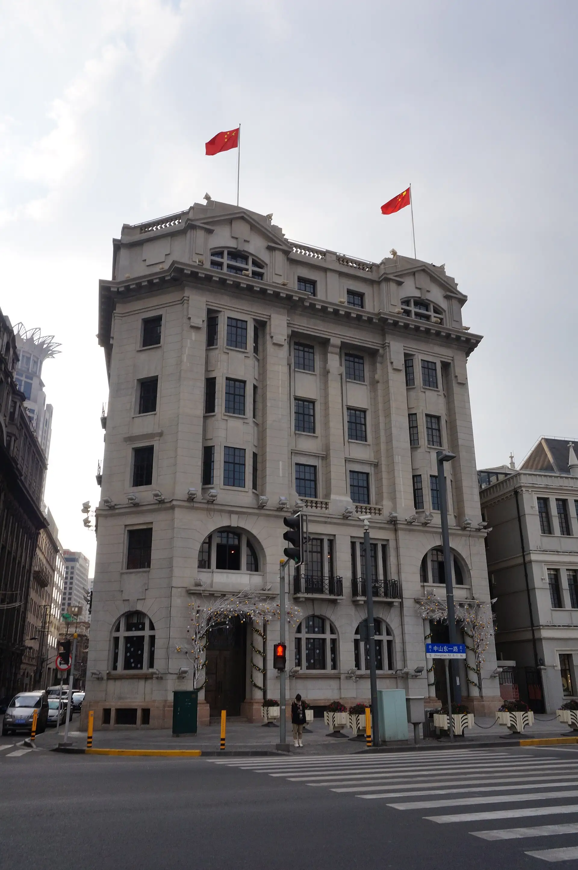 The Nissin Building, a narrow six-storey stone façade on the Bund.